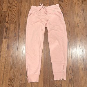 Soft Light pink sweatpants with rose gold details.